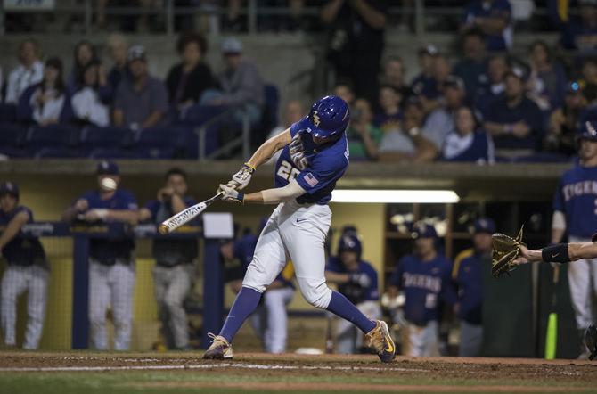 LSU sophomore outfielder Antoine Duplantis (20) hits a pitch during the Tigers' 5-1 win against the University of Georgia on Saturday, March 18, 2017 at Alex Box Stadium.