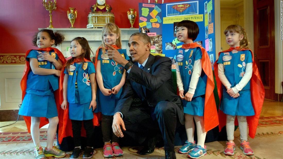 Former president Barack Obama greets girl scouts on March 23 during the 2015 White House Science Fair that celebrates winners of STEM competitions.&#160;