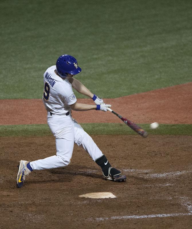 LSU freshman infielder and outfielder Zach Watson (9) swings at the ball on Friday, March 17, 2017, during the Tigers' 22-9 victory over UGA at Alex Box Stadium.