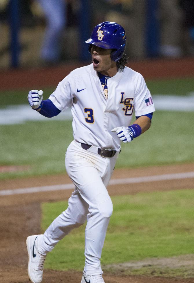 LSU senior short stop Kramer Robertson (3) celebrates after being walked during LSU's 4-3 win against Mississippi State on Saturday June 10, 2017, at Alex Box Stadium.