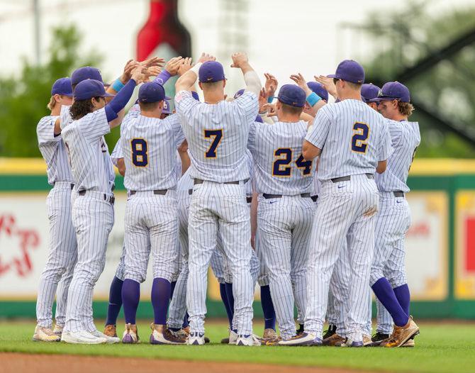 The LSU baseball team huddles before the game on Tuesday, April 18, 2017, during the Tigers&#8217; 10-4 victory over Lamar at Alex Box Stadium.