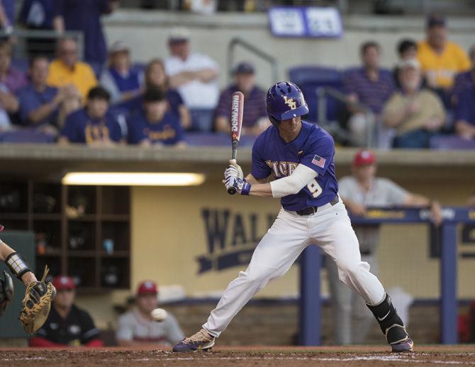 LSU freshman infielder and outfielder Zach Watson (9) watches a pitch during the Tigers' 5-1 win against the University of Georgia on Saturday, March 18, 2017 at Alex Box Stadium.