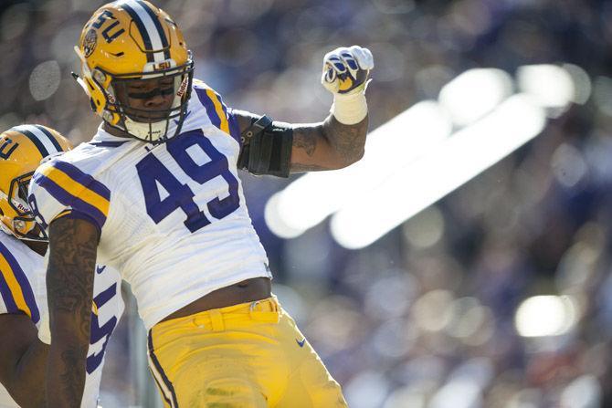 LSU sophmore defensive end Arden Key (49) celebrating after the Tigers scored during halftime against University of Florida on Nov. 19, 2016, at Death Valley.