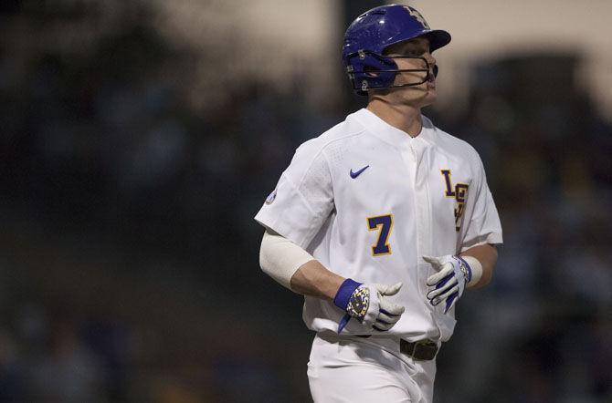 LSU junior infielder Greg Deichmann (7) runs to first base on Friday, March 17, 2017, during the Tigers' 22-9 victory over UGA at Alex Box Stadium.