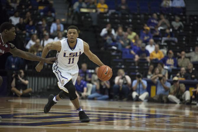 LSU junior guard Jalyn Patterson (11) takes the ball around a South Carolina player during the Tigers' 88-63 loss to South Carolina on Wednesday, Feb. 1, 2017 at the Pete Maravich Assembly Center.