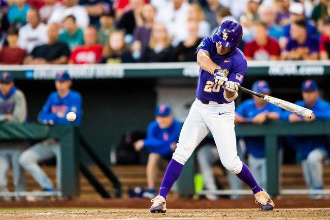 LSU sophomore outfielder Antonie Duplantis (20) takes a swing at an incoming pitch during the Tigers' 4-3 loss against the Gators on Monday June 26, 2017, at TD Ameritrade Park in Omaha, Nebraska.