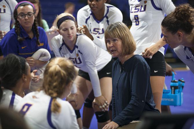 LSU volleyball head coach Fran Flory strategizes with players during the Tigers' 3-1 loss against Southern Miss on Saturday, Sept. 3, 2016 in the Pete Maravich Assembly Center.