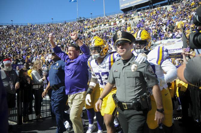 LSU Head Coach Ed Orgeron leading his team onto the field during Tigers' 16-10 Loss against University of Florida on Nov. 19, 2016, at Death Valley.