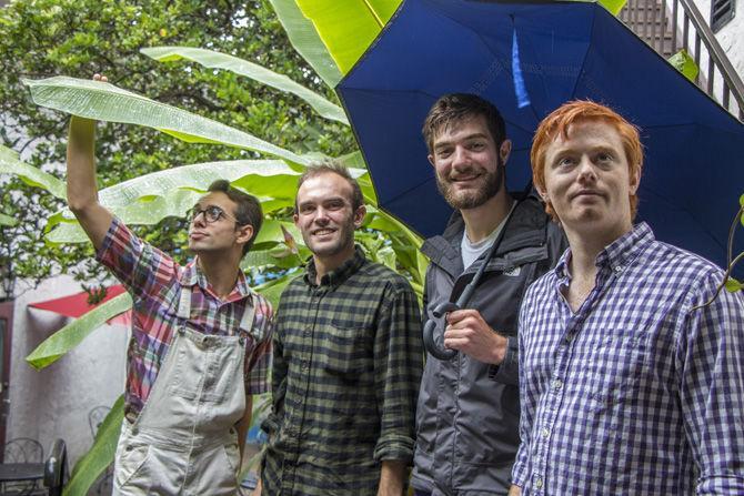 Members of Wumbo (from left to right) Zak Ocmand, LSU percussion performance junior Mitchell Mobley, LSU percussion performance junior Kevin McCabe, and LSU alumni Jake Heflin stand outside Highland Coffees on Aug. 8, 2017.