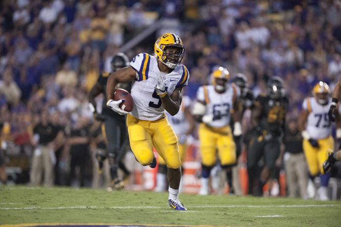 LSU sophomore running back Derris Guice (5) runs the ball during the Tigers' 42-7 victory against Missouri on Saturday, Oct. 1, 2016 in Tiger Stadium.&#160;