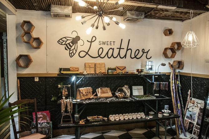 The main wall lined with purses, jewelry, and other accessories at Sweet Leather on Friday, Aug. 25, 2017 at their location just off of Government St.