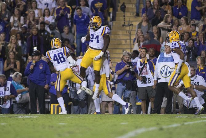 LSU junior linebacker Donnie Alexander (48) and freshman linebacker Devin White (24) celebrating after a big play on Saturday Oct. 22, 2016 during the Tigers' 38-21 victory over Ole Miss at Tiger Stadium.