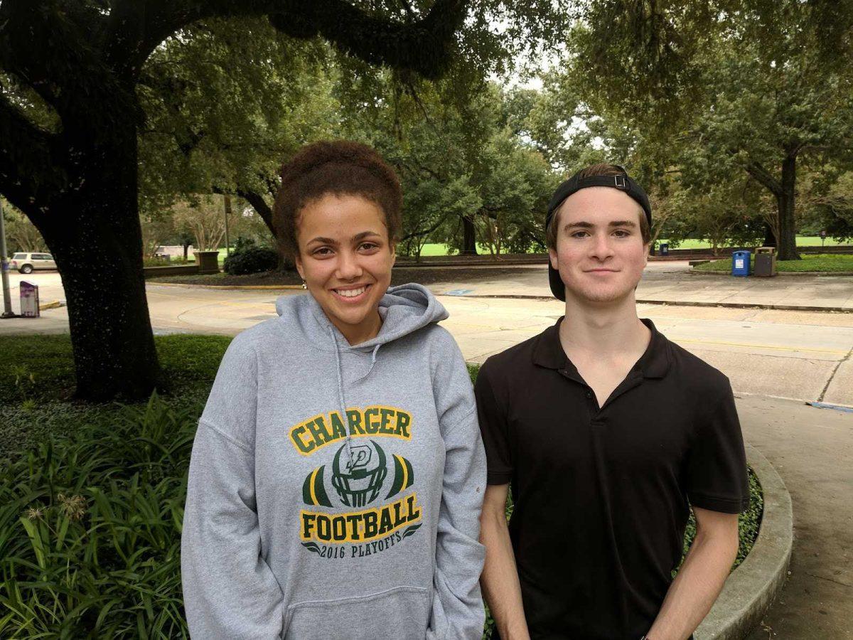 Pre-med freshman Cassie Rammidi and industrial engineering freshman Ben Haynie respond to the cancellation of classes near the Parade Ground on Wednesday, Aug. 30, 2017.