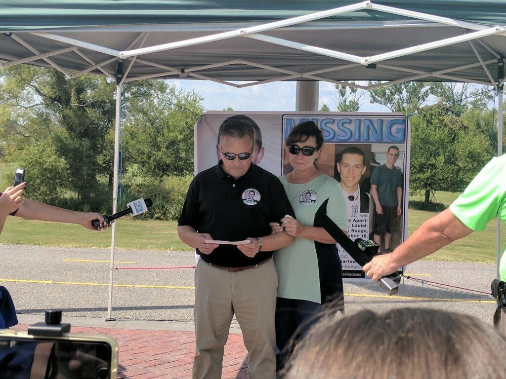 The parents of missing University student, Michael Nickelotte, Jr., speak at a press conference at the corner of River Road and Skip Bertman Drive on Friday, Sept. 29, 2017.