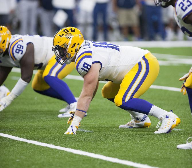 LSU senior defensive end Christian LaCouture (18) prepares to block on Saturday, Sep. 2, 2017, during the Tigers' 27-0 win against the BYU Cougars in the Mercedes-Benz Superdome in New Orleans, Louisiana.