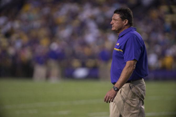 LSU coach Ed Orgeron heads toward the sideline during the Tigers' spring game on Saturday, April 22, 2017 at Tiger Stadium.