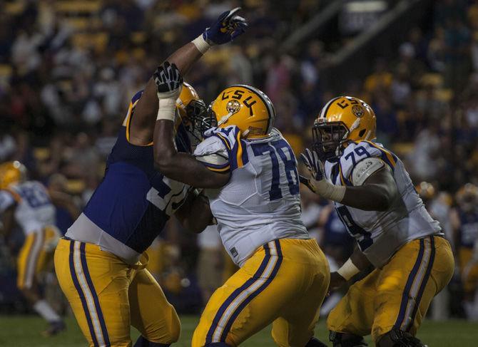 Junior offensive lineman Garrett Brumfield (78) tries to block sophomore defensive end Rashard Lawrence during the Tigers' spring game on April 22, 2017 at Tiger Stadium.