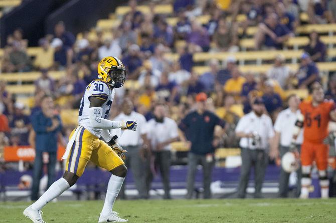 LSU freshman defensive back Eric Monroe (30) runs on the field during the Tigers' 35-26 win against Syracuse on Saturday, Sept. 23, 2017.