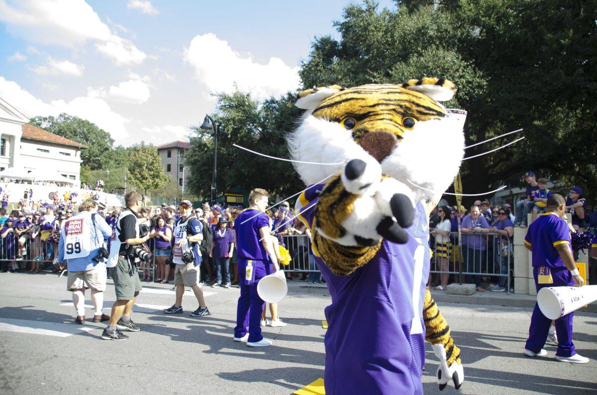 Mike the Tiger marches down Victory Hill before the LSU vs. Troy homecoming game on Saturday, Sept. 30, 2017