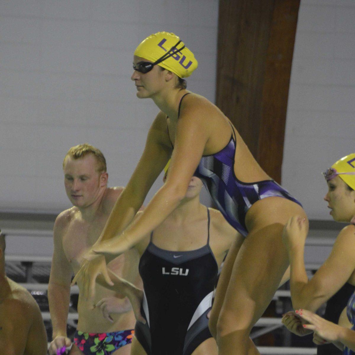 LSU senior swimmer Jane MacDougall&#160;prepares to dive into the water at practice on Friday, Sept. 15, 2017, at the LSU Natatorium on Lakeshore Drive.