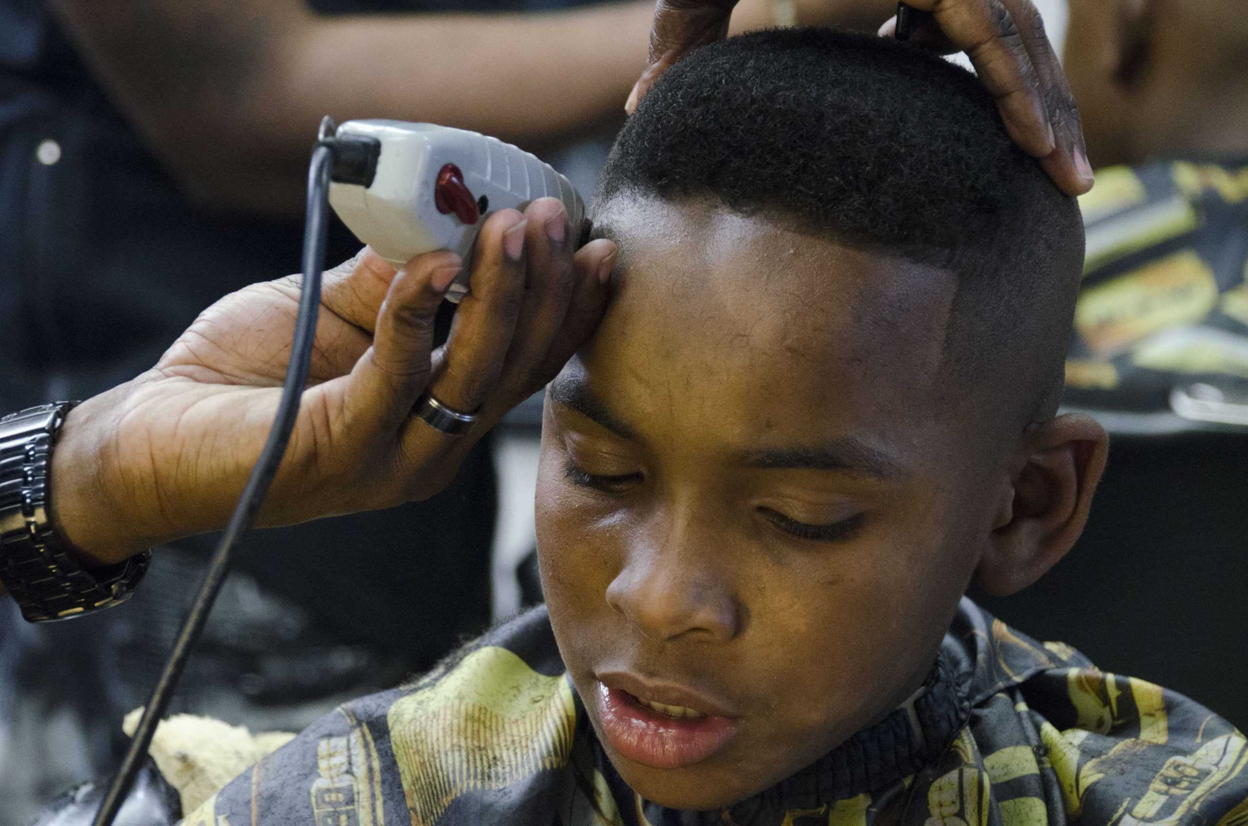 Local barber and LSU Museum of Art work to improve youth literacy