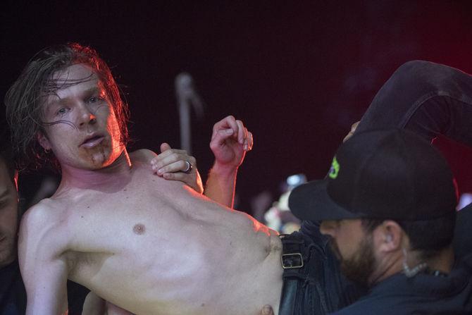 Matt Schultz, lead singer of Cage The Elephant, interacts with the fans, and rides the crowd on Saturday Oct. 29, 2016 at the Voodoo Music and Arts Experience (Voodoo Festival) at City Park in New Orleans, Louisiana.