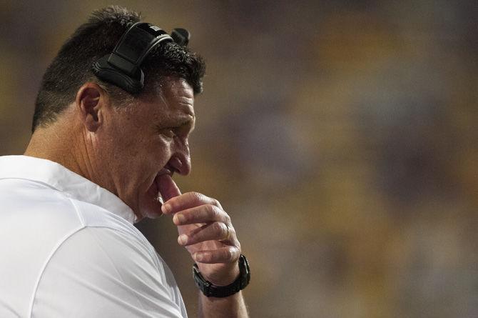 Coach Orgeron stares intensley at his players during Tigers&#8217; 24-21 loss against Troy on Saturday, Sept. 30, 2017, in Tiger Stadium.