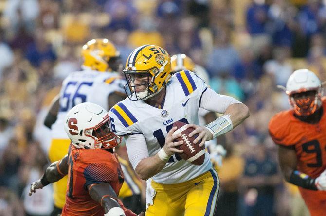 LSU senior quarterback Danny Etling (16) looks to make a play during the Tigers' 35-26 victory against Syracuse on Saturday, Sept. 23, 2017, in Tiger Stadium.