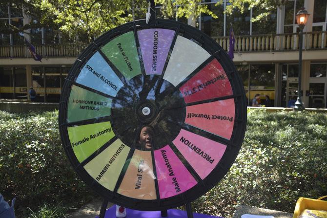 A wheel of topics pertaining to Sex Week sits at the Student Health Center table for the Safety, Sun and Sex Week: Sex Edition event on Friday, Sept. 8, 2017 at the Free Speech Plaza located in front of the Student Union Building.