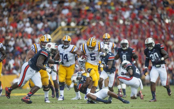 LSU freshman running back Derrius Guice (5) avoids getting tackled during the Tigers&#8217; 45-21 victory against Auburn on Saturday, Sept. 19, 2015 in Tiger Stadium