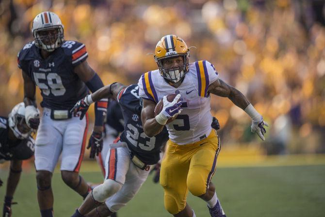 LSU freshman running back Derrius Guice (5) runs towards the end zone during the Tigers&#8217; 45-21 victory against Auburn on Saturday, Sept. 19, 2015 in Tiger Stadium