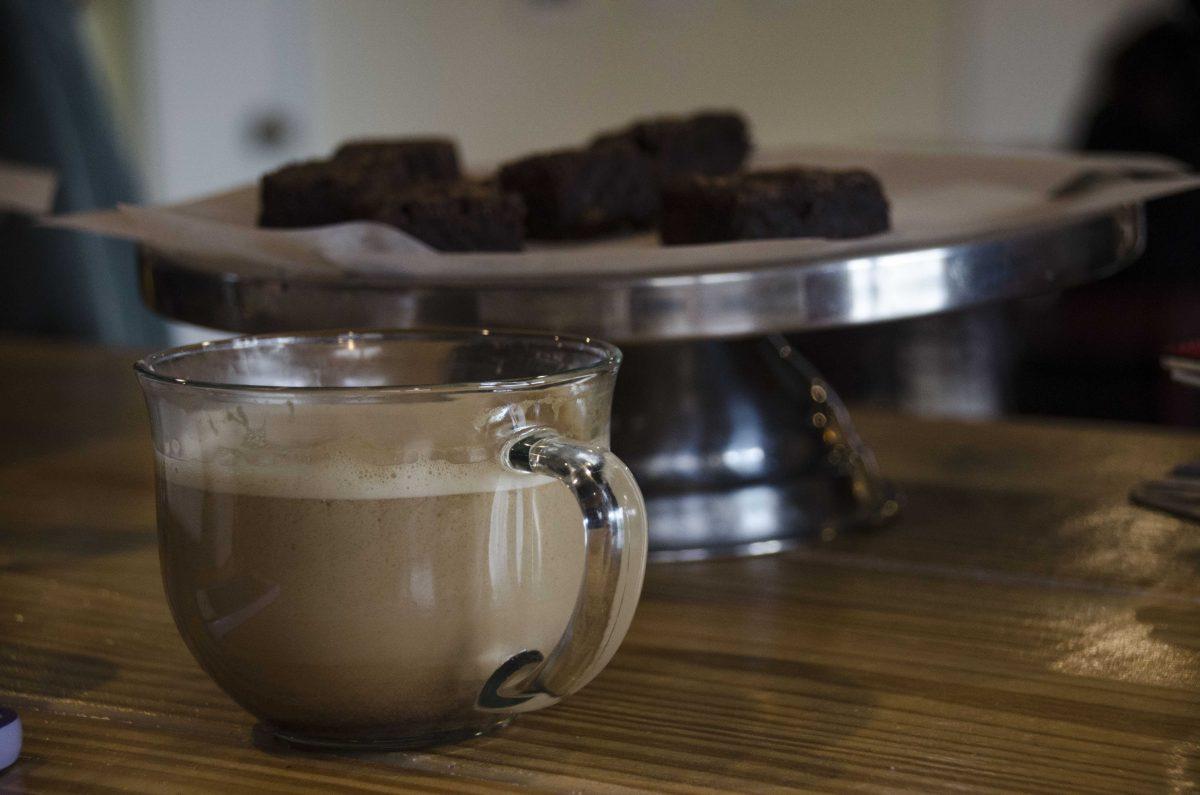 A latte sits on a table at the newly reopened Common Grounds Cafe on Dalrymple Drive on Monday, Oct. 9, 2017.