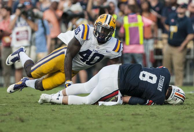 LSU sophomore linebacker Devin White (40) makes a play during LSU's 27-23 victory against Auburn on Saturday, Oct. 14, 2017 at Tiger Stadium.