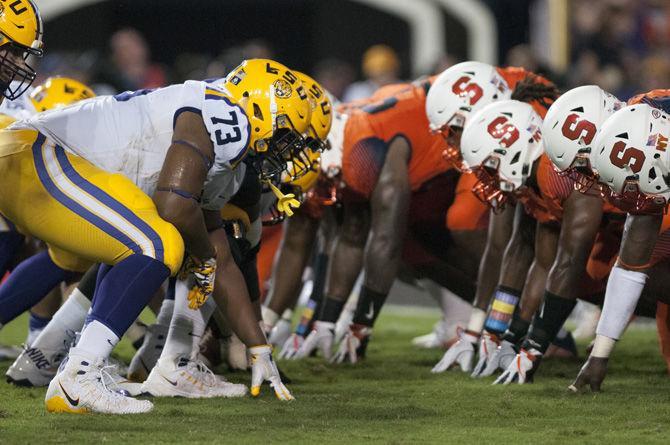 LSU football players line up during the Tigers' 35-26 win against Syracuse on Saturday, Sept. 23, 2017.