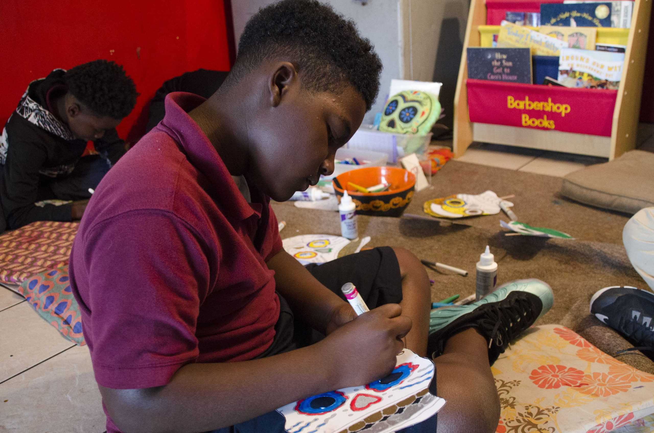 Local barber and LSU Museum of Art work to improve youth literacy