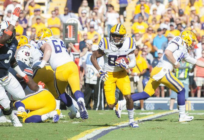 LSU senior wide receiver Russell Gage (83) runs the ball during Auburn's 23-14 lead against LSU at halftime on Saturday, Oct. 14, 2017, in Tiger Stadium.