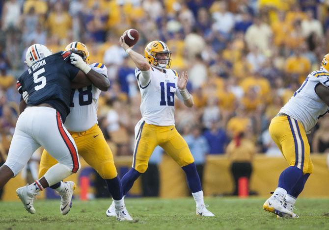 LSU senior quarterback Danny Etling (16) throws the ball during the Tigers' 27-23 victory against Auburn on Saturday, Oct. 14, 2017, in Tiger Stadium.