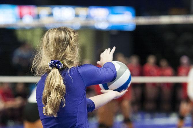 LSU freshman defensive specialist Raigen Cianciulli (5) serves the ball during the Lady Tigers' 3-0 win over the University of Houston on Saturday, Sept. 15, 2017, at the Pete Maravich Assembly Center.