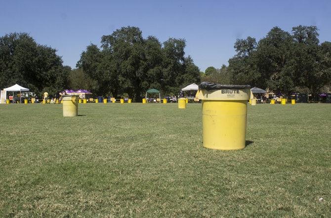 Trash cans sit in the sun at the Parade Ground on Sept. 20, 2017.