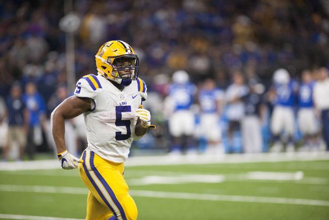 LSU junior running back Derrius Guice (5) runs back to position on Saturday, Sep. 2, 2017, during LSU's 14-0 lead at halftime in the Mercedes Benz Superdome in New Orleans, Louisiana.