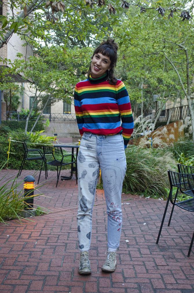 LSU studio art senior Sarah Ulm wears a pair of pants she painted on Tuesday, Nov. 28, 2017, at the Design Building.