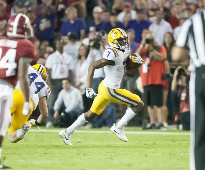 LSU senior wider receiver DJ Chark (7) runs with the ball during the Tigers' 10-24 loss to the University of Alabama on Saturday, Nov. 4, 2017, in Bryant&#8211;Denny Stadium in Tuscaloosa.