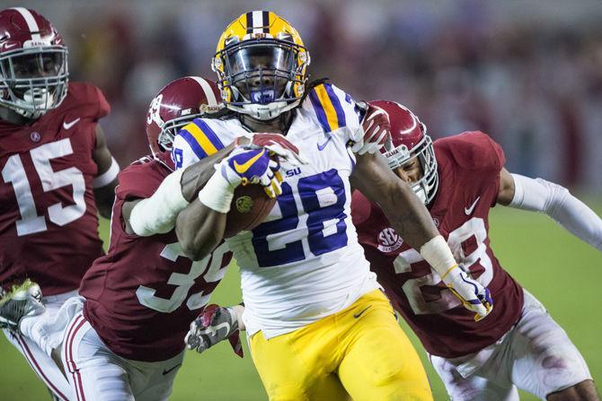 LSU senior running back Darrel Williams (28) runs the ball towards the end zone during the Tigers' 24-10 loss against Alabama on Nov. 4, 2017, at Bryant-Denny Stadium.