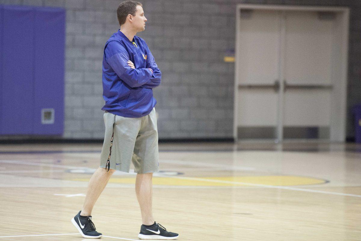 LSU head basketball coach Will Wade paces across the court as the team stretches during practice on Tuesday, Oct. 24, 2017, in the PMAC.