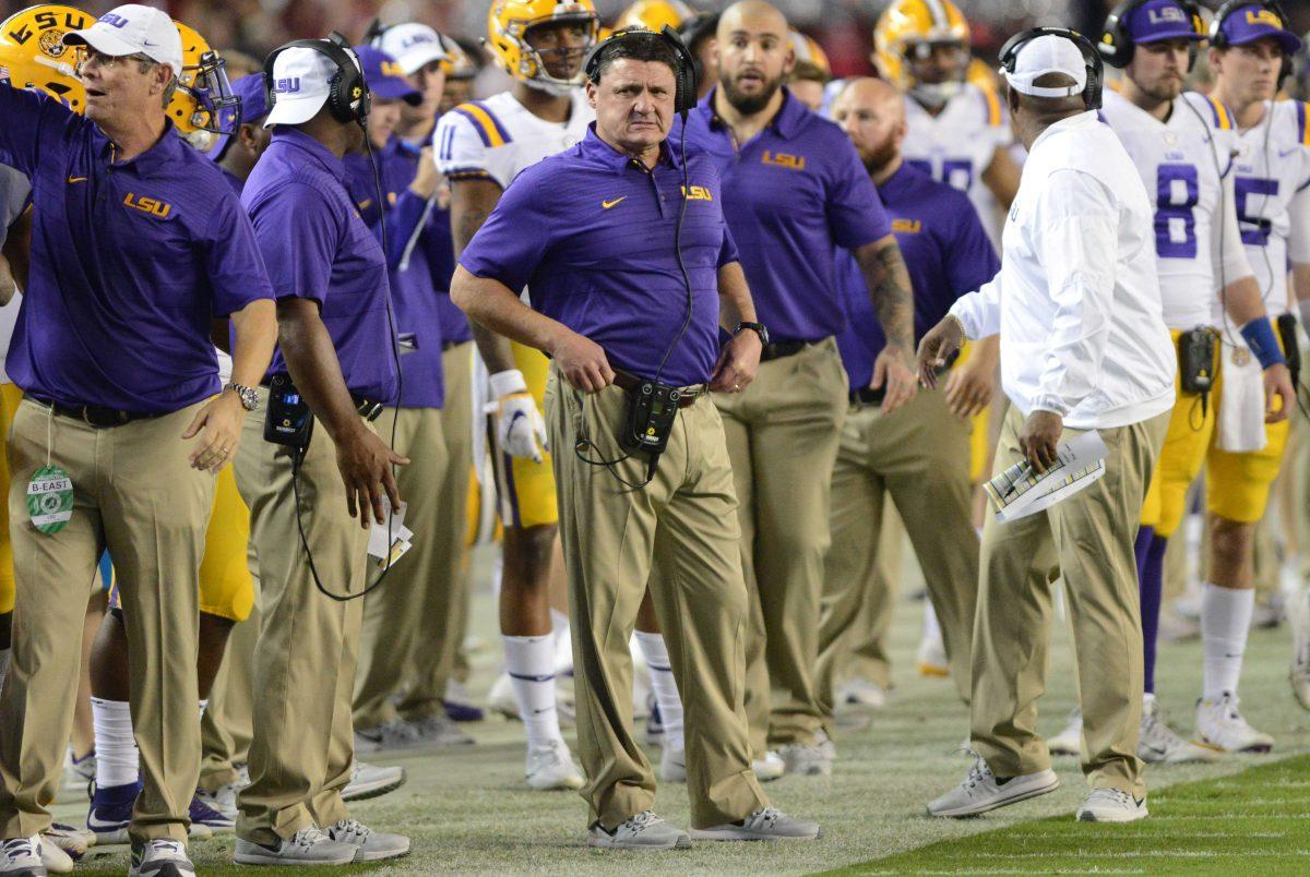 LSU head football coach Ed Orgeron watches as his team nears the end-zone during the Tigers' 24-10 loss against Alabama on Nov. 4, 2017, at Bryant-Denny Stadium.