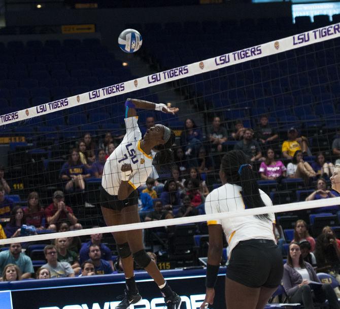 LSU freshman middle blocker and outside hitter Taylor Bannister (7) spike the ball during the Lady Tigers' 3-1 victory over the University of Alabama on Sunday, Oct. 15, 2017, in the Pete Maravich Assembly Center.