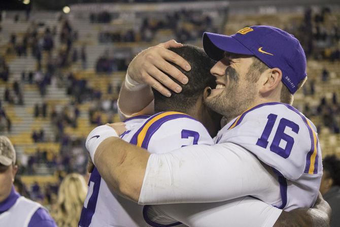 LSU senior quarterback Danny Etling (16) celebrates with teammates after the Tigers&#8217; 45-21 victory against Texas A&amp;M on Saturday, Nov. 25, 2017, in Tiger Stadium.