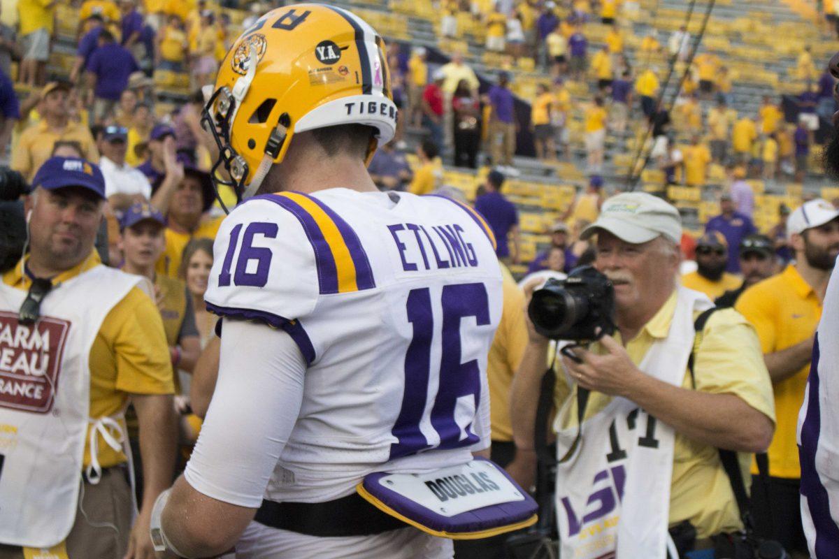 LSU senior quarterback Danny Etling (16) leaves the field after the LSU Tigers' 27-23 victory against Auburn on Saturday, Oct. 14, 2017 in Tiger Stadium.