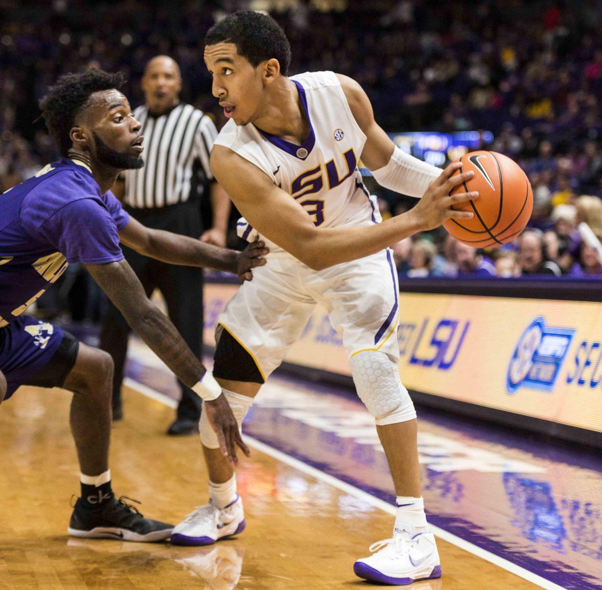 LSU freshman guard Tremont Waters (3) scans the court for an open teammate against Alcorn sophomore guard Maurice Howard (5) during LSU's 99-59 win over Alcorn on Friday Nov. 10, 2017, in the PMAC.