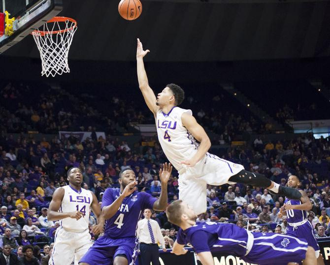 LSU sophomore guard Skylar Mays (4) attempts to shoot during the Tigers' 82-83 loss against the Stephen F. Austin Lumberjacks on Saturday, Dec. 16, 2017, in the PMAC.